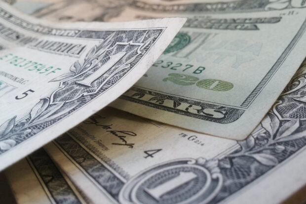 A photograph of US dollars.