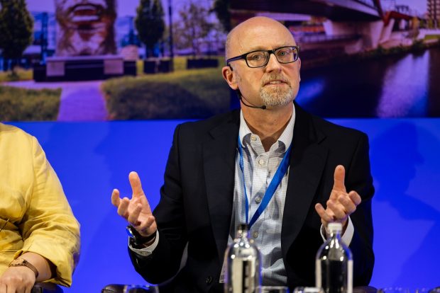 Phil Swan speaking at Global AI CIties on 17 June