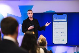 Science secretary Peter Kyle demonstrating the GOV.UK app
