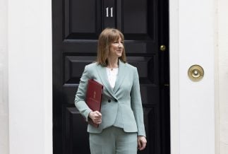 Chancellor Rachel Reeves standing outside 11 Downing Street