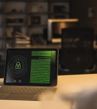 Tablet PC with security system and data on screen in office