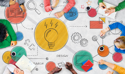 A illustration of people drawing ideas on paper.