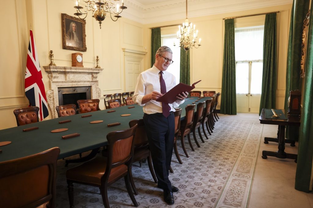 A picture of UK prime minister Keir Starmer reading the King's Speech in the Cabinet Room