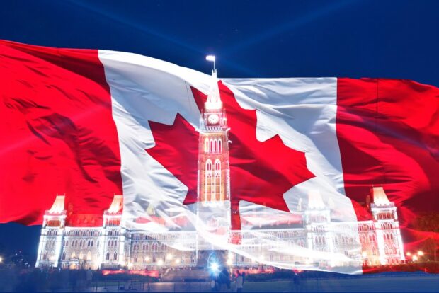 A montage image of the Canadian flag with Canadian parliament building in the background
