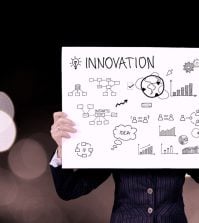 An image depicting a sign with Innovation ideas written on it