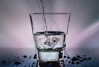 Water being poured into a glass.